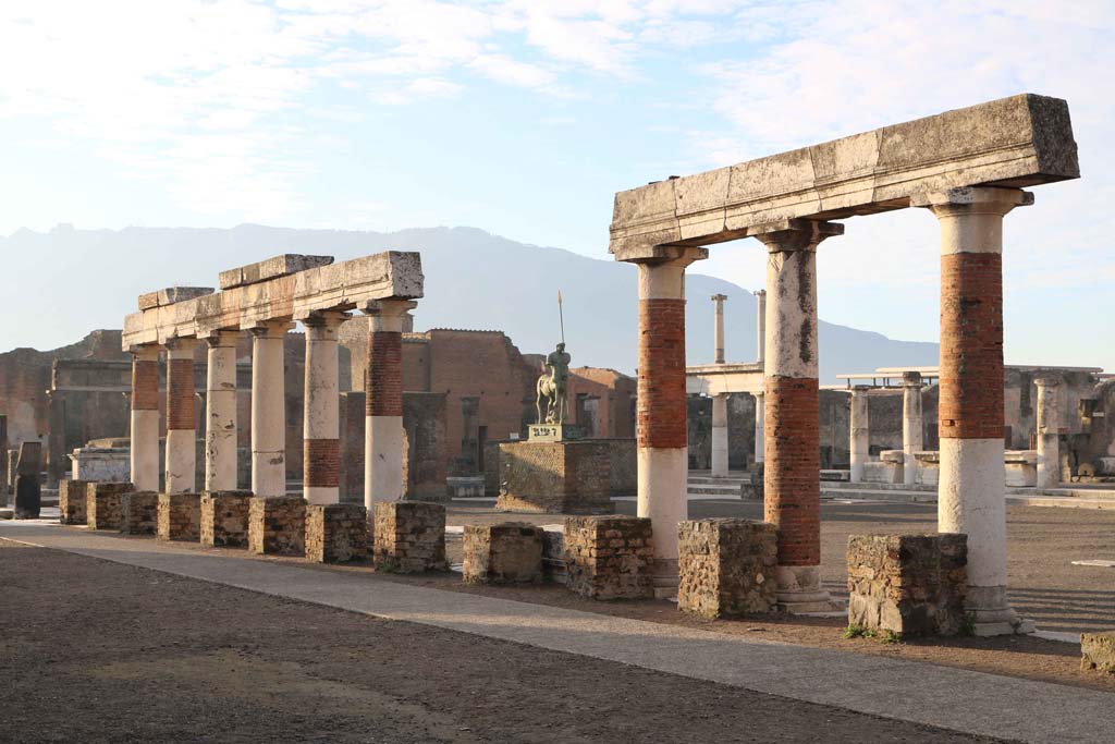 VII.8.00 Pompeii Forum, east side. December 2018.
Looking south-west from rear of portico of Eumachia’s Buildings. Photo courtesy of Aude Durand.