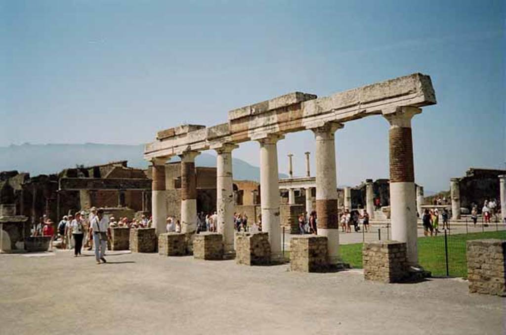 VII.8 Pompeii Forum. May 2010. Looking south-west towards the Basilica, from the east side at the rear of the Eumachia’s portico. Photo courtesy of Rick Bauer.