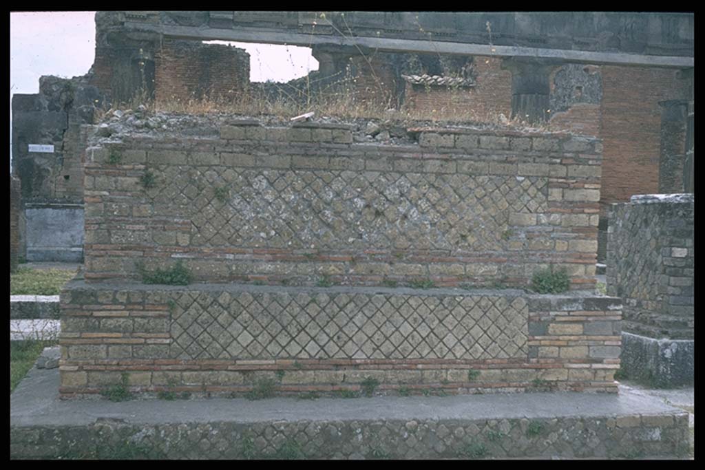 VII.8 Pompeii Forum. Looking south towards large statue base in south-east corner.
Photographed 1970-79 by Günther Einhorn, picture courtesy of his son Ralf Einhorn.