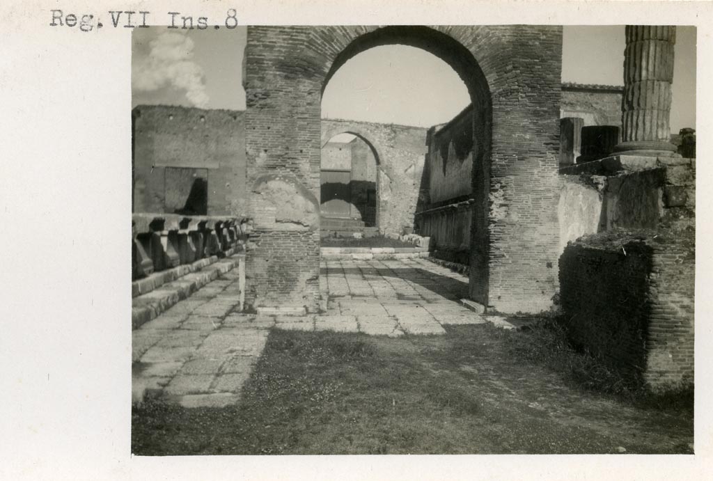 VII.8.1 Pompeii. Pre-1937-39. Looking north through Arch of Augustus and towards west side of Temple of Jupiter.
Photo courtesy of American Academy in Rome, Photographic Archive. Warsher collection no. 1112.