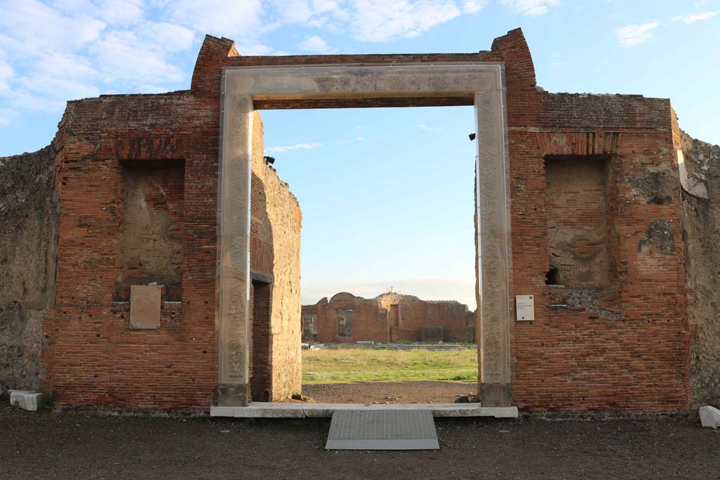 VII.9.1 Pompeii. December 2018. Portico 1. Looking east through entrance doorway 6. Photo courtesy of Aude Durand.