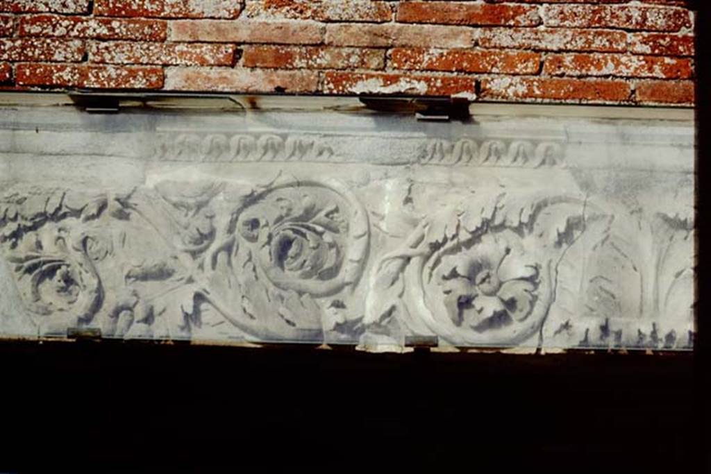 VII.9.1 Pompeii. 1991. Entrance decoration, top left of middle of doorway.
Source: The Wilhelmina and Stanley A. Jashemski archive in the University of Maryland Library, Special Collections (See collection page) and made available under the Creative Commons Attribution-Non Commercial License v.4. See Licence and use details. J91f0015