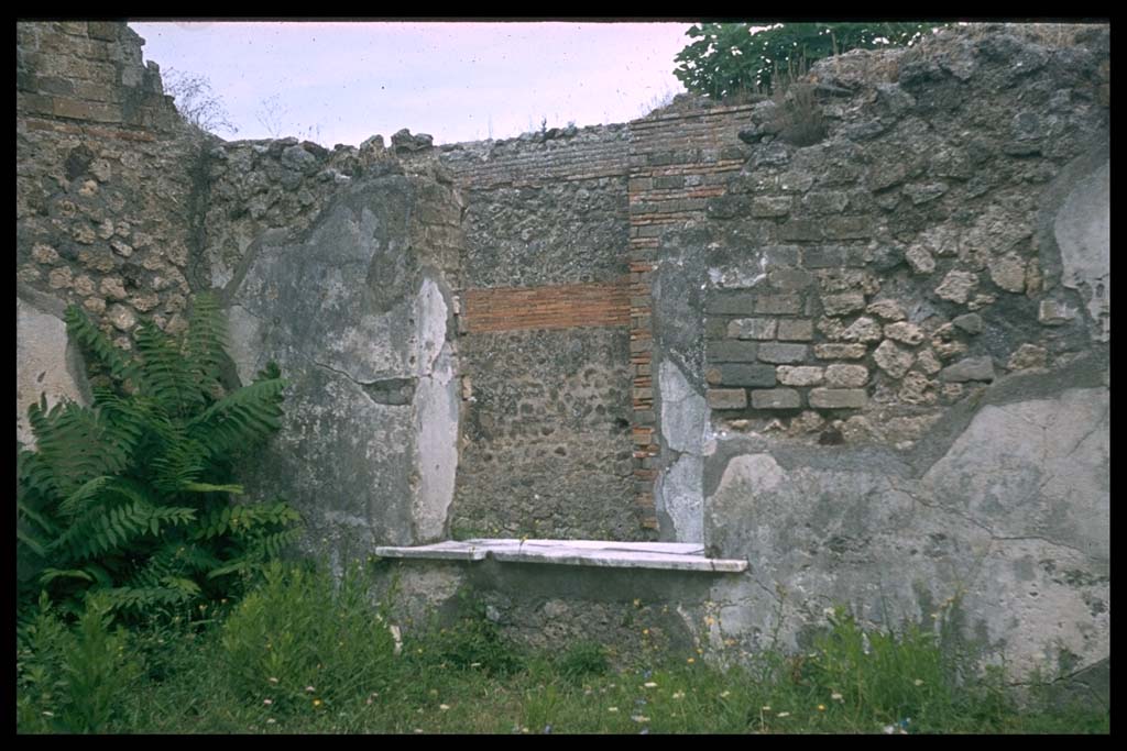 VII.9.1 Pompeii. Window in rear wall of light court 11. Looking north-east into east corridor 12.
Photographed 1970-79 by Günther Einhorn, picture courtesy of his son Ralf Einhorn.