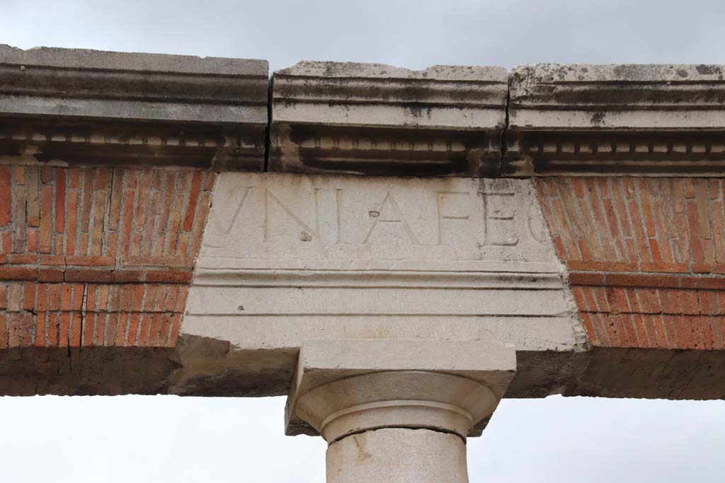 VII.9.1 Pompeii. October 2020. Portico of Eumachia’s Building, part of inscription. Photo courtesy of Klaus Heese.