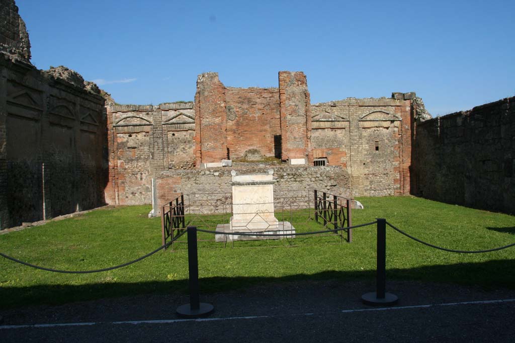 VII.9.2 Pompeii. April 2013. Looking towards east wall with cella and podium. Photo courtesy of Klaus Heese.