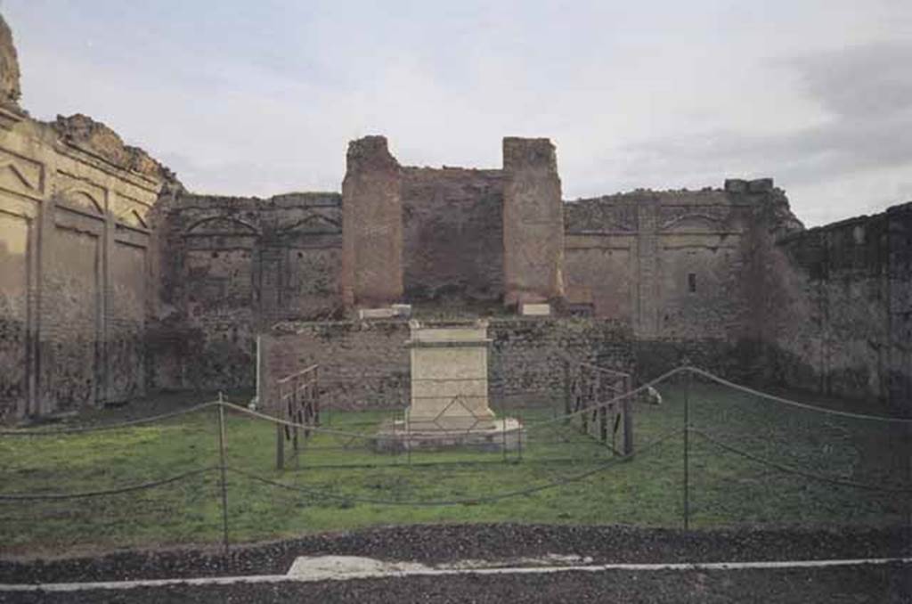 VII.9.2 Pompeii. May 2010. East wall with cella and podium. Photo courtesy of Rick Bauer.