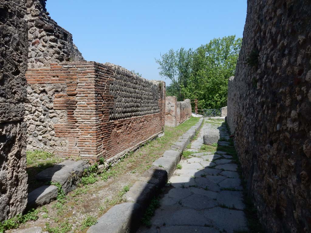 VII.16.14 Pompeii. September 2005. Doorway leading to room 4, steps to upper floor.  
