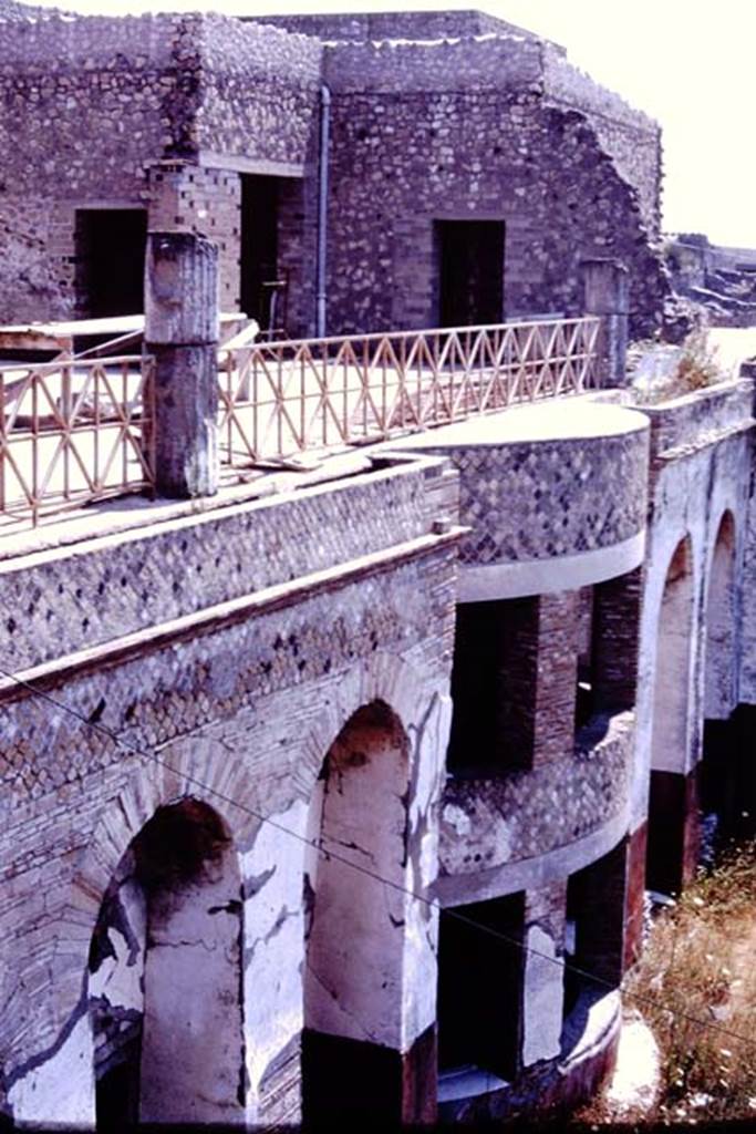 VII.16.17-22 Pompeii. 1977. Looking south-east across upper terrace portico, and down to lower levels. Photo by Stanley A. Jashemski.
Source: The Wilhelmina and Stanley A. Jashemski archive in the University of Maryland Library, Special Collections (See collection page) and made available under the Creative Commons Attribution-Non Commercial License v.4. See Licence and use details. J77f0415