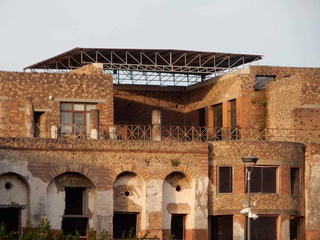 VII.16.17-22 Pompeii. June 2019. Looking east from rear towards the upper terrace and the area of the stately oecus.
Photo courtesy of Buzz Ferebee.