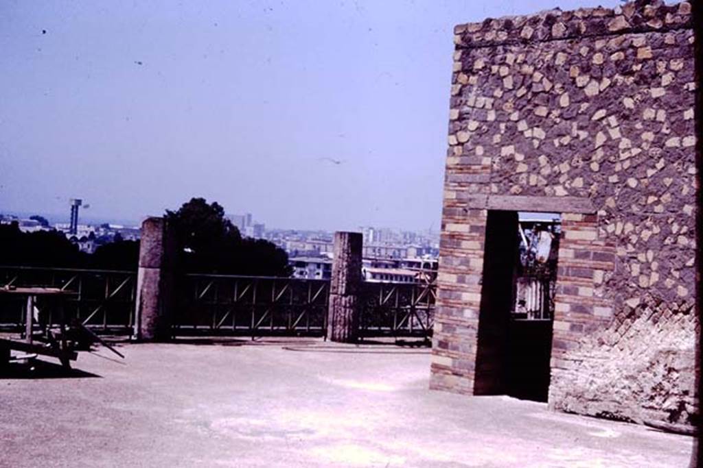 VII.16.17-22 Pompeii. 1977. Looking north-west across upper terrace portico, from the area of the stately oecus. Photo by Stanley A. Jashemski.
Source: The Wilhelmina and Stanley A. Jashemski archive in the University of Maryland Library, Special Collections (See collection page) and made available under the Creative Commons Attribution-Non Commercial License v.4. See Licence and use details. J77f0417