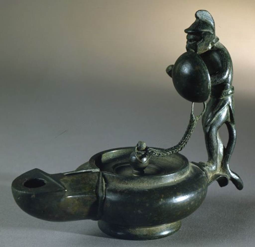 VI.16.19 Pompeii. Bronze lamp with a monkey in Gladiators armour. SAP 13958.