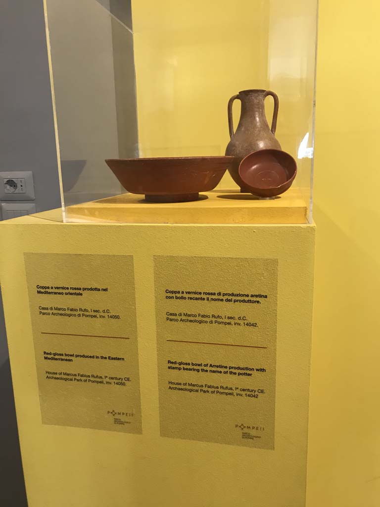 VII.16.17-22, Pompeii. April 2019.
Red gloss bowl produced in the Eastern Mediterranean. PAP inventory number 14050 (left).
Red gloss bowl of Arretine production with stamp bearing the name of the potter. PAP inventory number 14042 (right).
Photo courtesy of Rick Bauer.