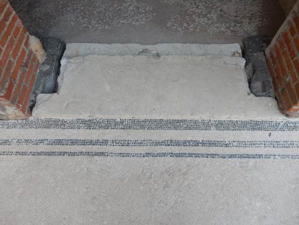 VIII.2.16 Pompeii. May 2017. Threshold of doorway to cubiculum in south-east corner of atrium, a single slab of limestone. Photo courtesy of Buzz Ferebee.
