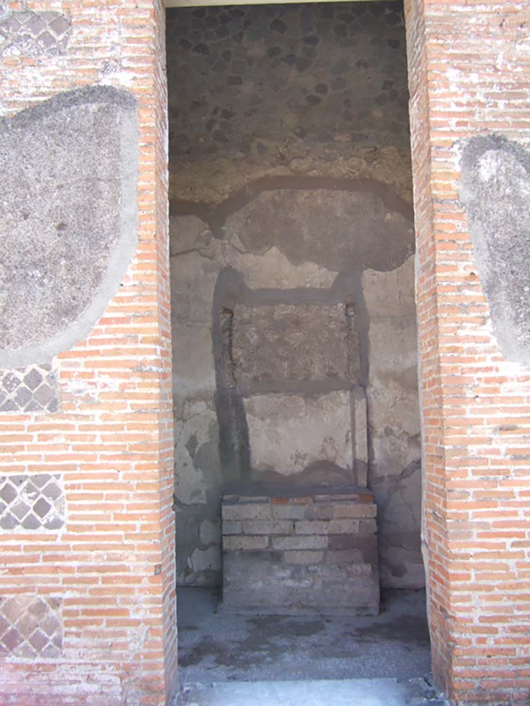 VIII.2.16 Pompeii. September 2005.
Doorway to room on south side of atrium, with household shrine.