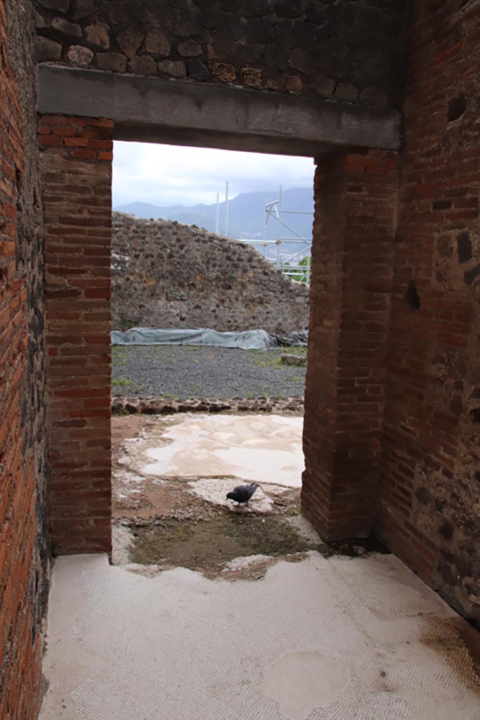 VIII.2.16 Pompeii. May 2024.
Looking south through doorway into large room which originally may have been part of VIII.2.18.
Photo courtesy of Klaus Heese.