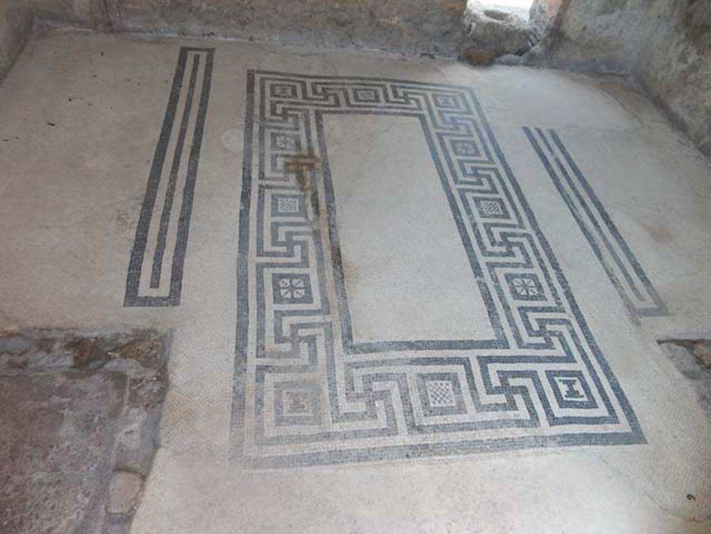 VIII.2.16 Pompeii. May 2018. Flooring in cubiculum on north side of atrium showing two areas for separate beds. Photo courtesy of Buzz Ferebee.