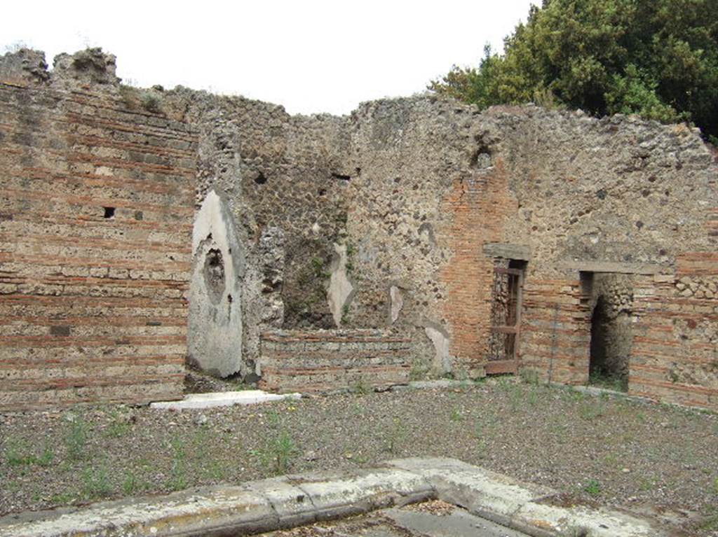 VIII.2.39 Pompeii. May 2006. Doorways to Rooms l, m, n and kitchen. North west corner of atrium.
