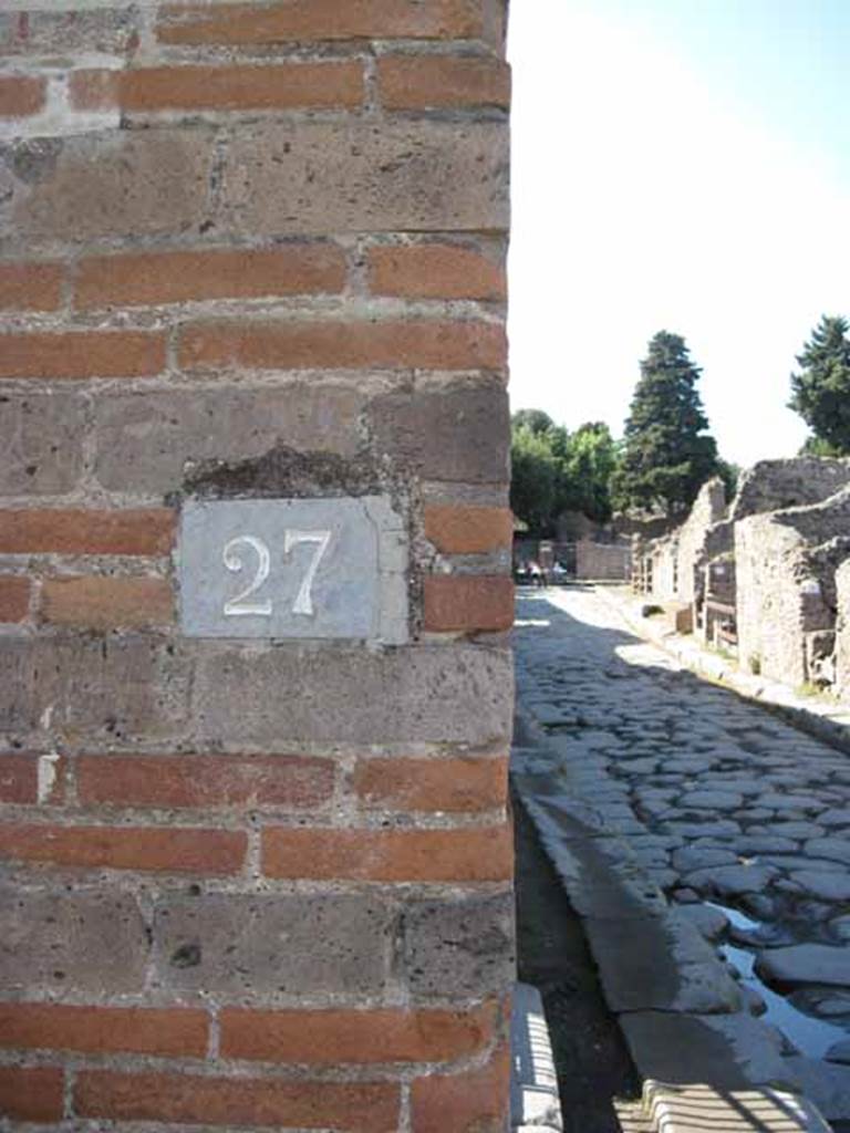 VIII.7.27 Pompeii. September 2010. Mid way in passage, looking south towards theatre. VIII.7.27A is on left of image by marble step. Photo courtesy of Drew Baker.