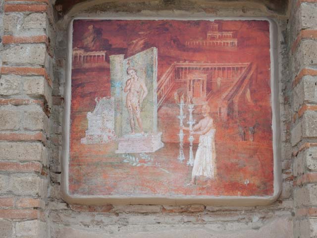 VIII.7.28 Temple of Isis or Tempio di Iside.  Painted panel found on the bottom centre of the south wall in the Ekklesiasterion.  Now in Naples Archaeological Museum.