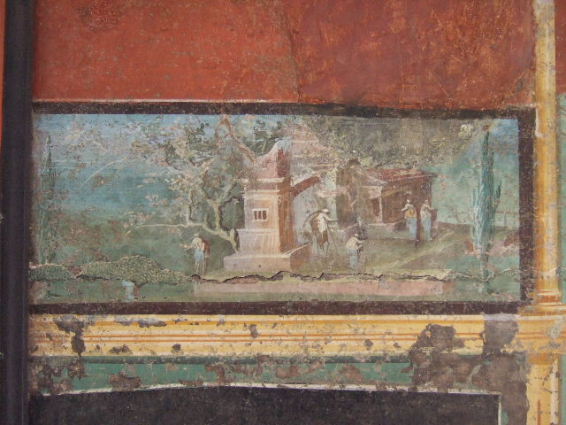 VIII.7.28 Found in Temple of Isis or Tempio di Iside.  Puteal decorated with Hercules with club and wearing a crown and taking part in Bacchic rituals.  Found in the area of the pastophorion (Priest�s rooms).  Now in Naples Archaeological Museum.