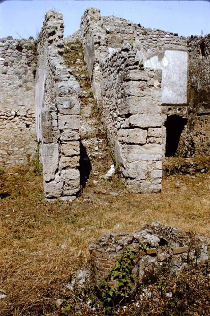 IX.2.27 Pompeii. 1964.
Stairs to upper floor, on east side of peristyle. On the left is the cubiculum. Photo by Stanley A. Jashemski.
Source: The Wilhelmina and Stanley A. Jashemski archive in the University of Maryland Library, Special Collections (See collection page) and made available under the Creative Commons Attribution-Non-Commercial License v.4. See Licence and use details.
J64f1308