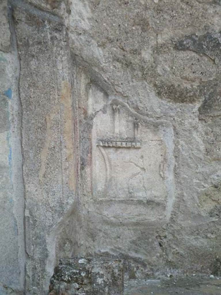 IX.3.5 Pompeii. September 2015. Remains of plaster decoration on west wall behind altar.