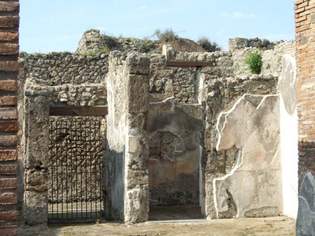 IX.3.5 Pompeii. March 2009. Room 30. Secondary atrium. Looking north east towards rear entrance at IX.3.24, rooms 28 and 29.
