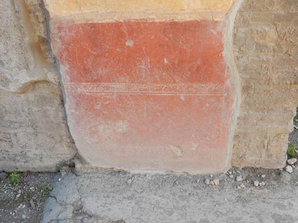 IX.3.5 Pompeii. May 2015. Room 6, painted decoration from zoccolo on east wall of ala, on north side of doorway to room 11. Photo courtesy of Buzz Ferebee.