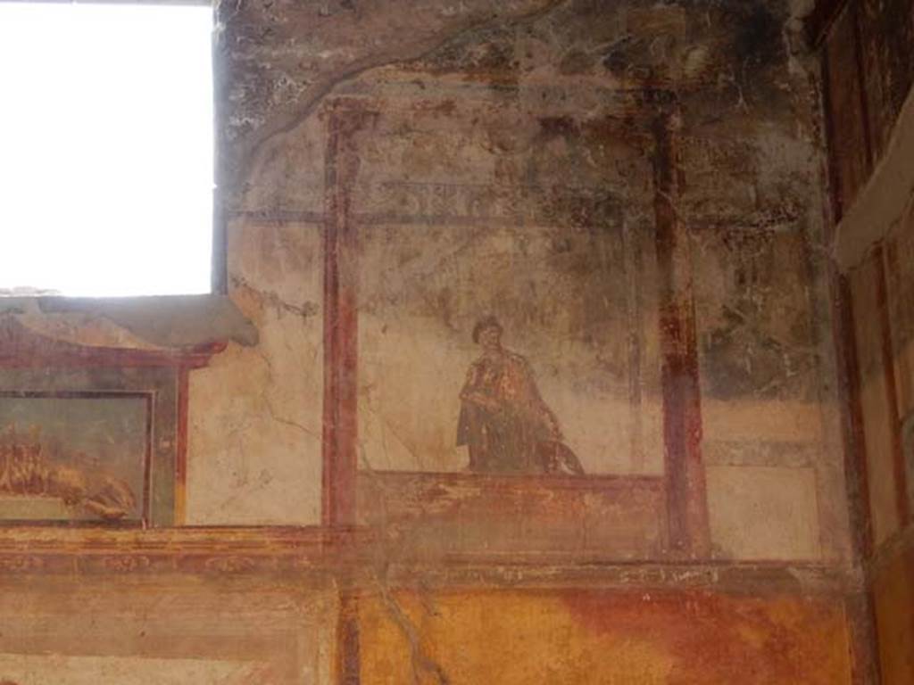 IX.3.5 Pompeii. May 2015. Room 13, painting of figure at upper west end of south wall. Photo courtesy of Buzz Ferebee.