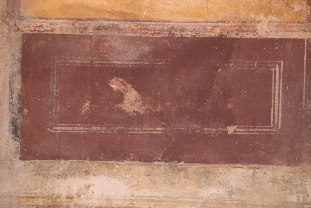 IX.3.5 Pompeii. October 2023.
Room 13, detail of painted panther from lower south wall at west end, in predella. Photo courtesy of Klaus Heese.