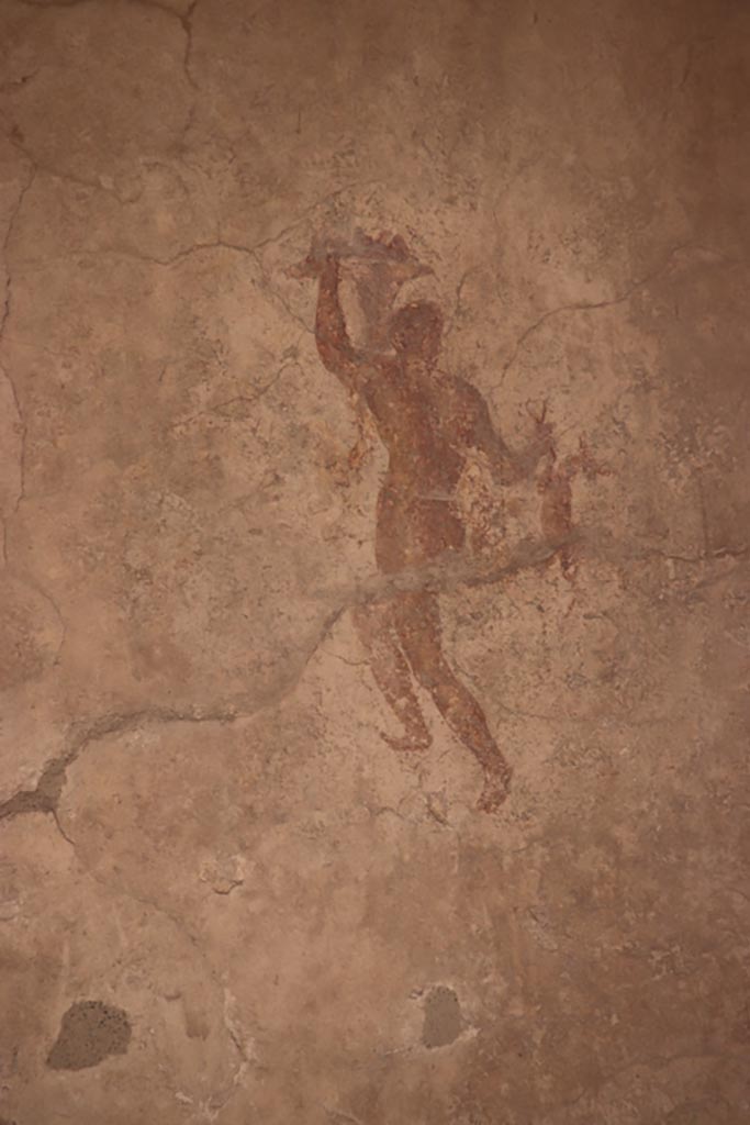 IX.3.5 Pompeii. October 2023.
Room 15, painted figure from west end of south wall. Photo courtesy of Klaus Heese.