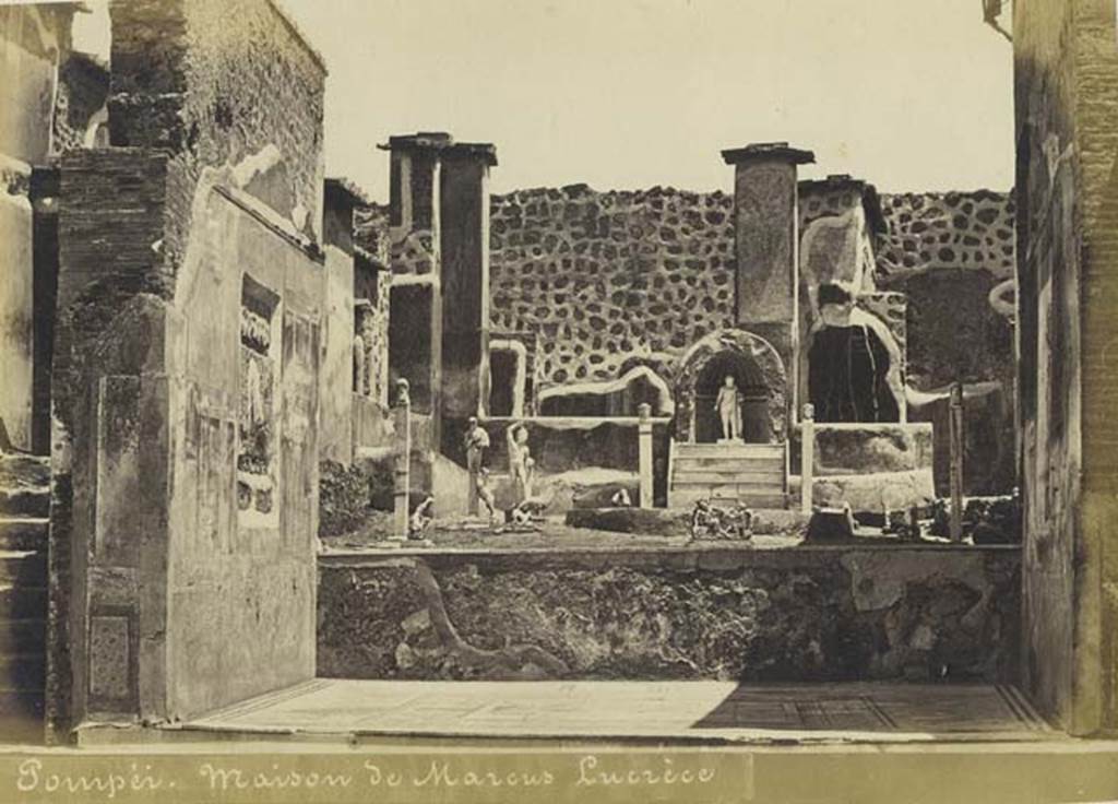 IX.3.5 Pompeii. Old undated photograph by Mauri, numbered 017. Looking towards the north wall of room 12, the tablinum, with view to raised garden at rear. Photo courtesy of Rick Bauer.