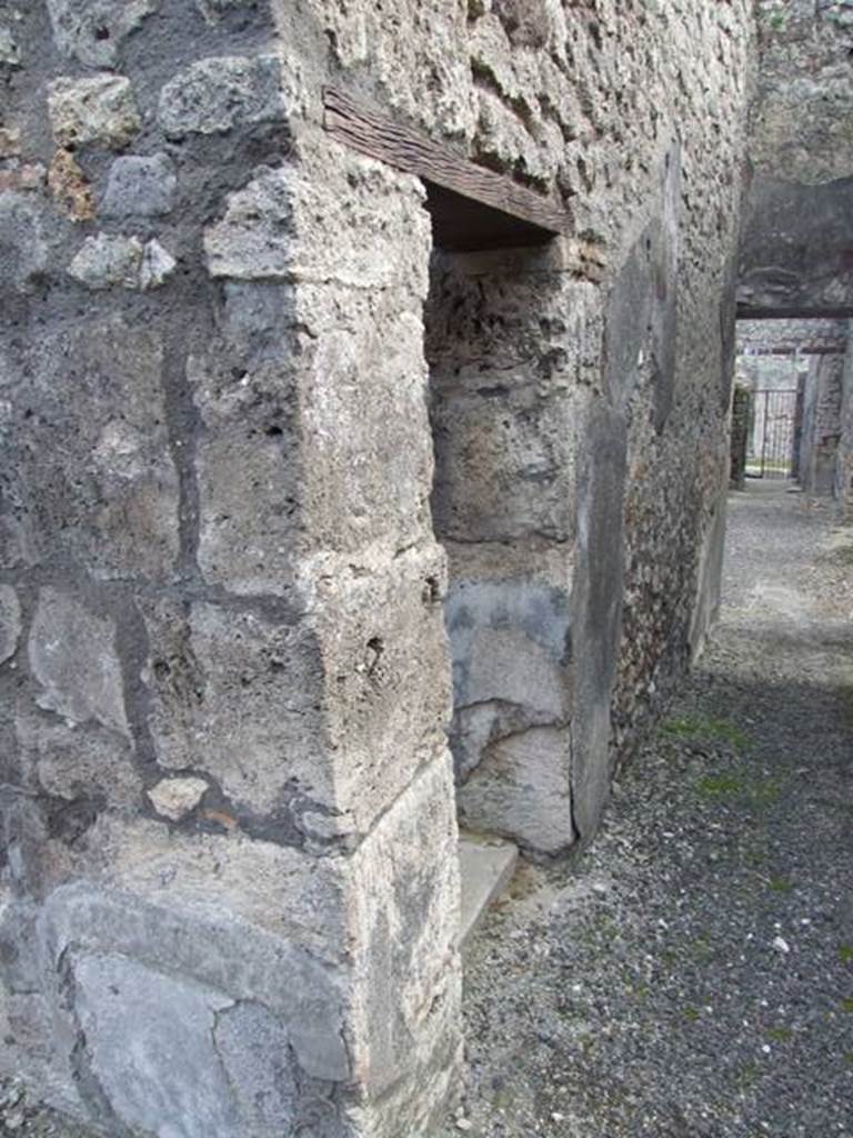 IX.3.15 Pompeii. March 2009. Small Door on west side of room 8, from corridor.