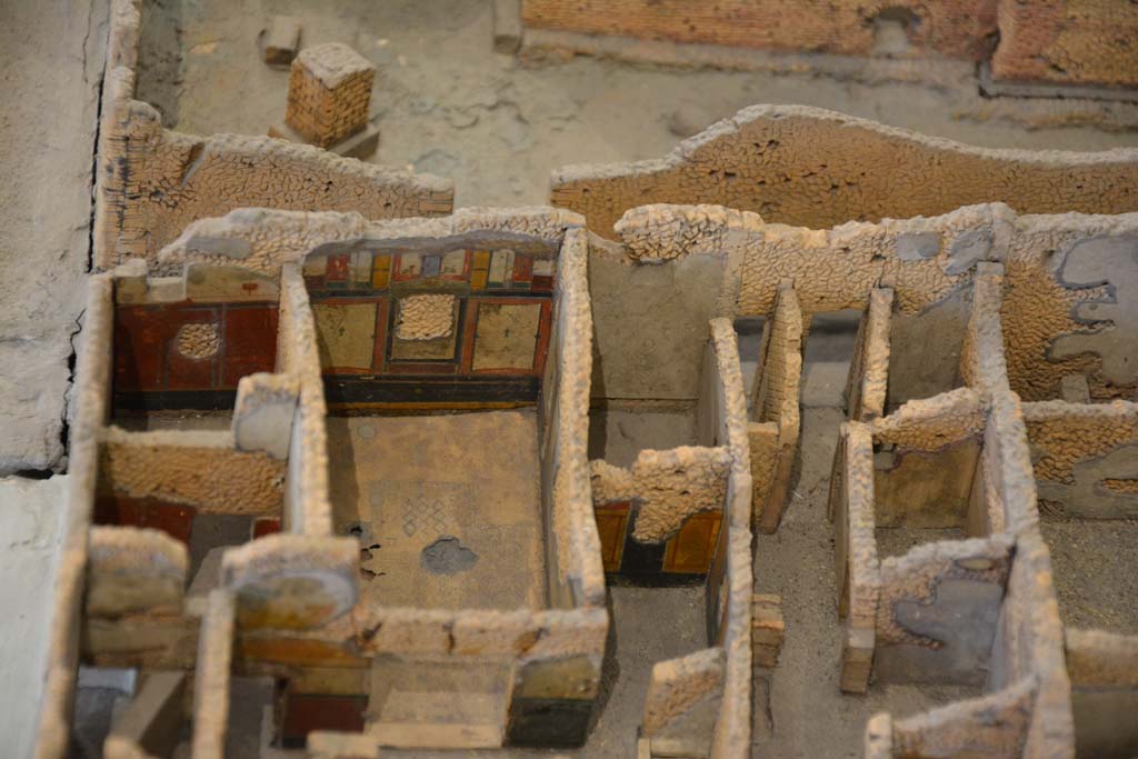 IX.5.18/19 Pompeii. July 2017.
Looking west to rooms e and f in south-west corner, with doorways at IX.5.20/21, centre right, onto Vicolo di Tesmo.
From cork model in Naples Archaeological Museum.
Foto Annette Haug, ERC Grant 681269 DÉCOR