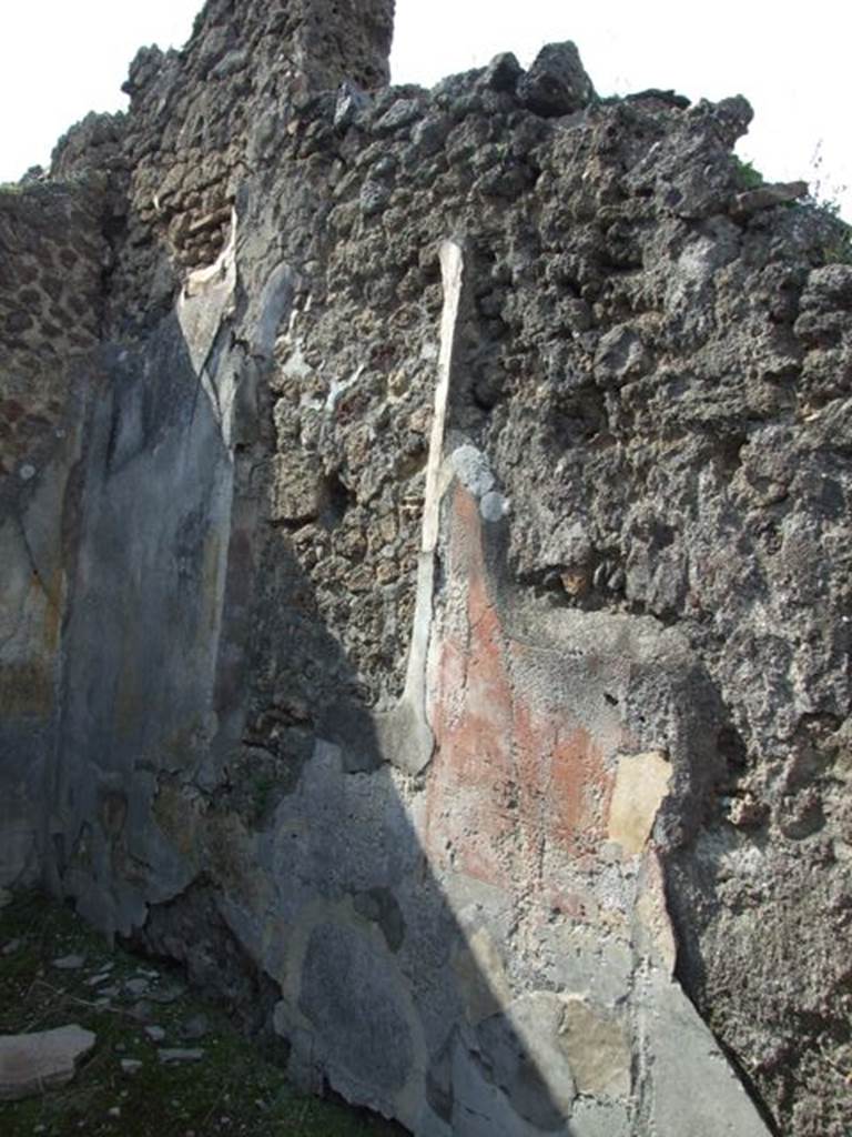 IX.5.18 Pompeii. March 2009. Room g, north wall of cubiculum with site of wall painting of Hercules, Deianira and Nessus. Now in Naples Archaeological Museum. Inventory number: 111474. The north wall was described as having a black zoccolo with yellow panelled walls in the middle zone, with a central aedicula containing the painting.