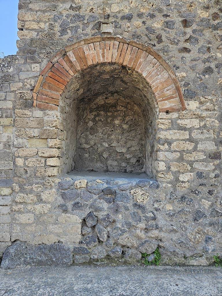 Pompeii II.4.7a. November 2024. Street shrine at east end of II.4. Photo courtesy of Annette Haug.