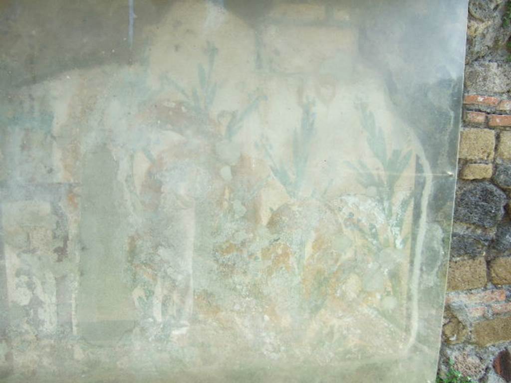 Right hand side of painted street shrine on the wall at V.6.19. December 2005.