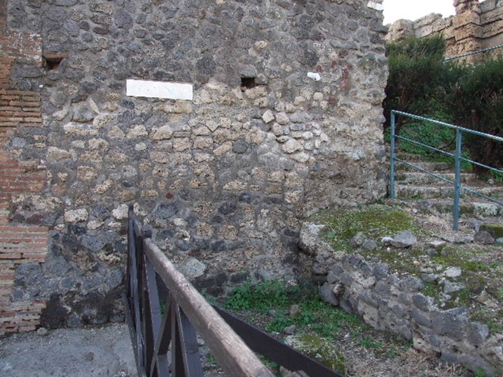VI.7.26 Pompeii. West part of wall containing street altar which used to be at the north end of the Via di Mercurio.