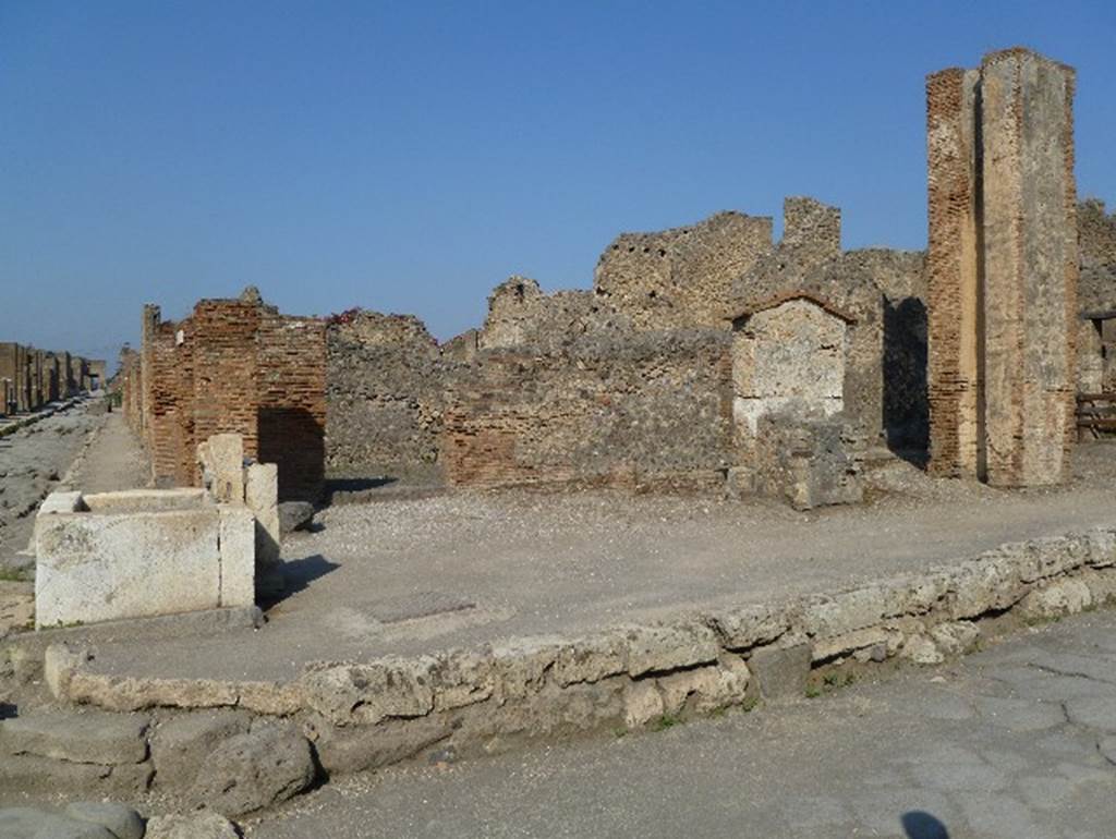 Altar outside VI.14.17-18. July 2010. Fountain, street altar and water column. Photo courtesy of Michael Binns.