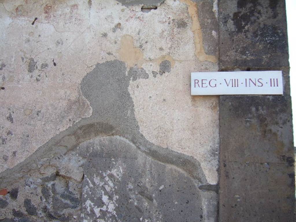 Painted street shrine on corner of insula at VIII.3.11 September 2005.