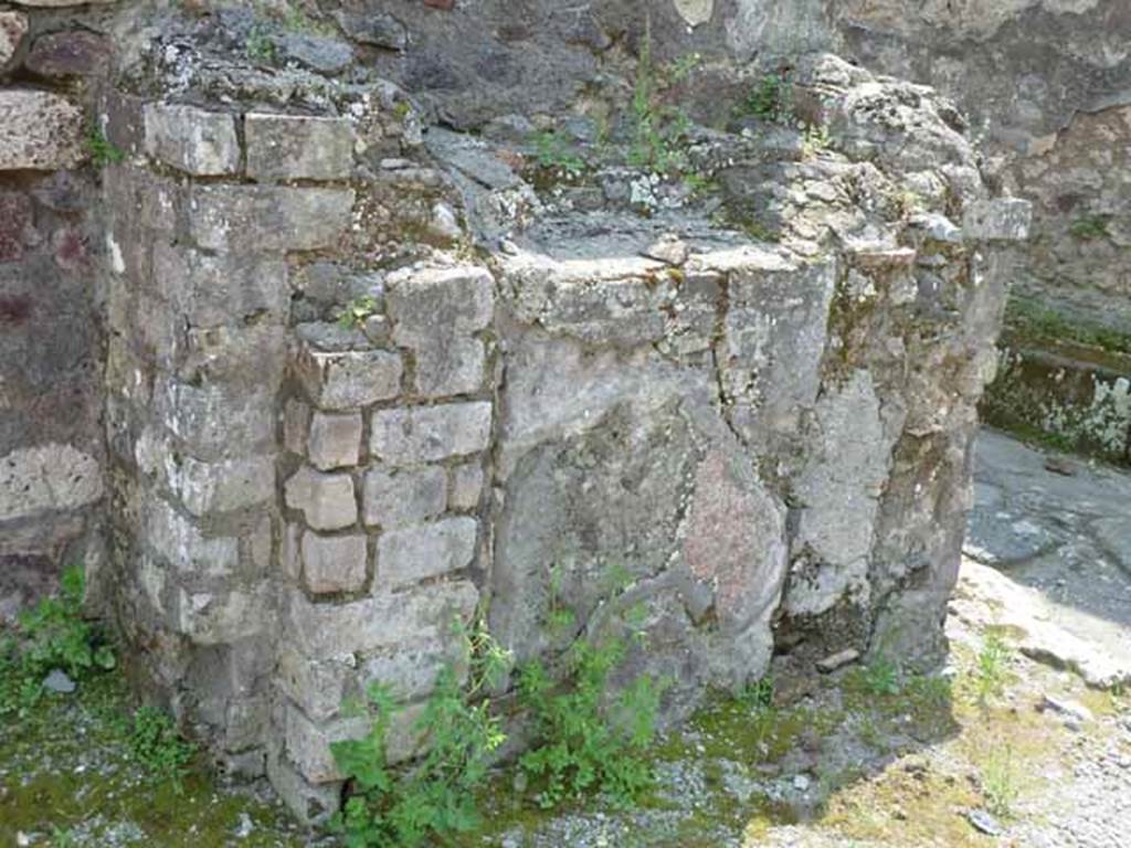 IX.8.1 Pompeii. May 2010. North front side of street altar.