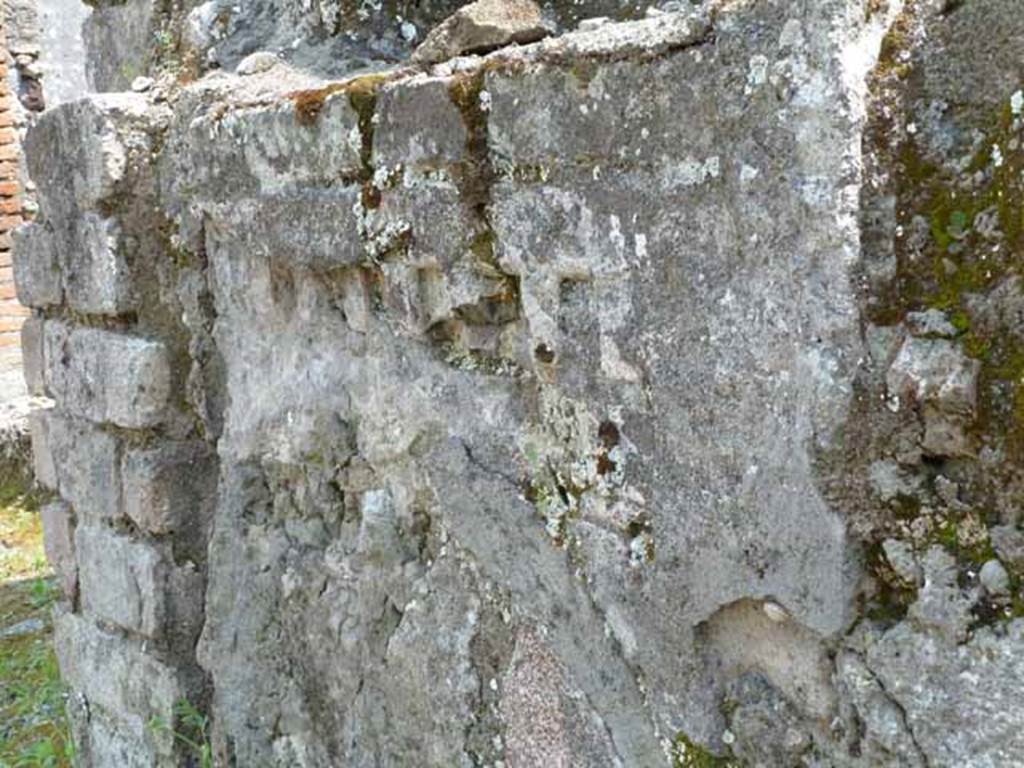IX.8.1 Pompeii. May 2010. Detail of front north faade from the west end.
