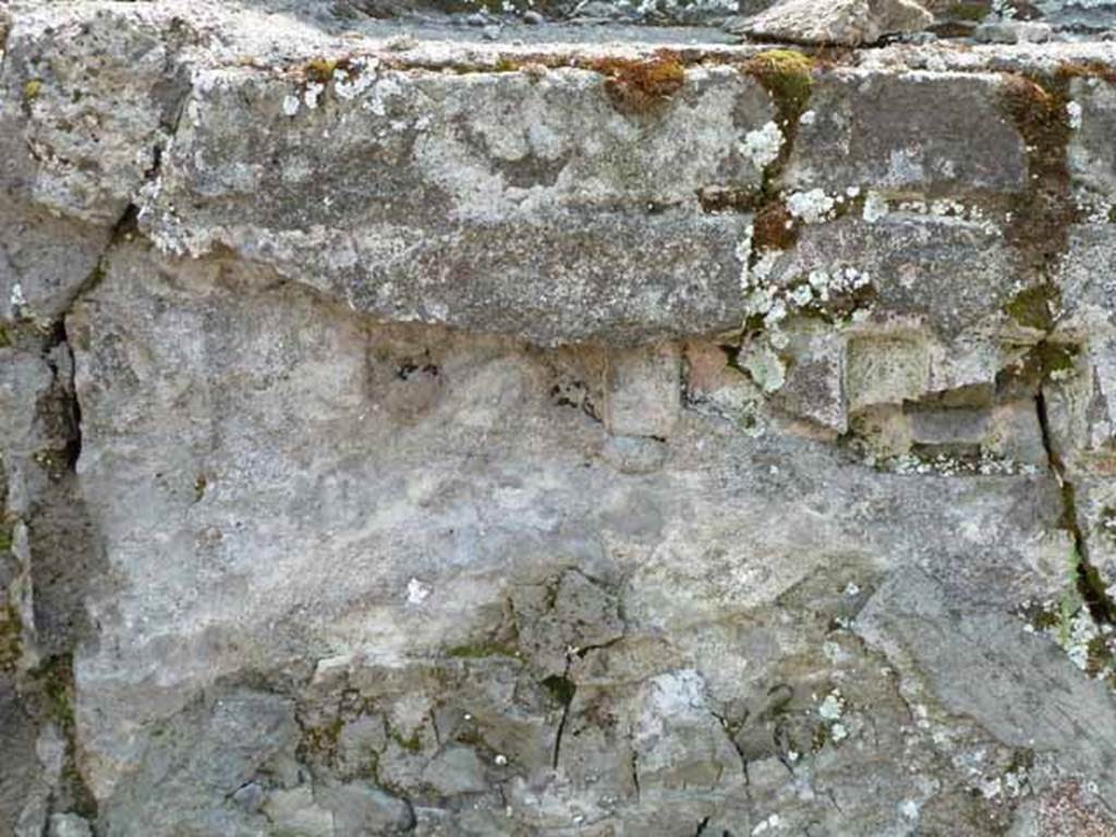 IX.8.1 Pompeii. May 2010. Detail of north front faade, east end.