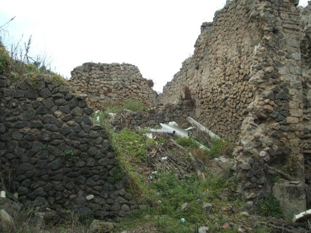 IX.8.8 Pompeii. March 2009. Street Altar on north side of entrance doorway, on right.