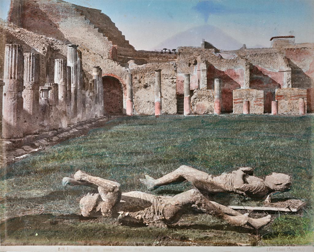 Victims 13 and 14, c.1890, in the Gladiator’s Barracks, looking north towards the Large Theatre.
Hand coloured albumen print, Edizione Esposito, number 118. On the left, victim 14. On the right, victim 13.