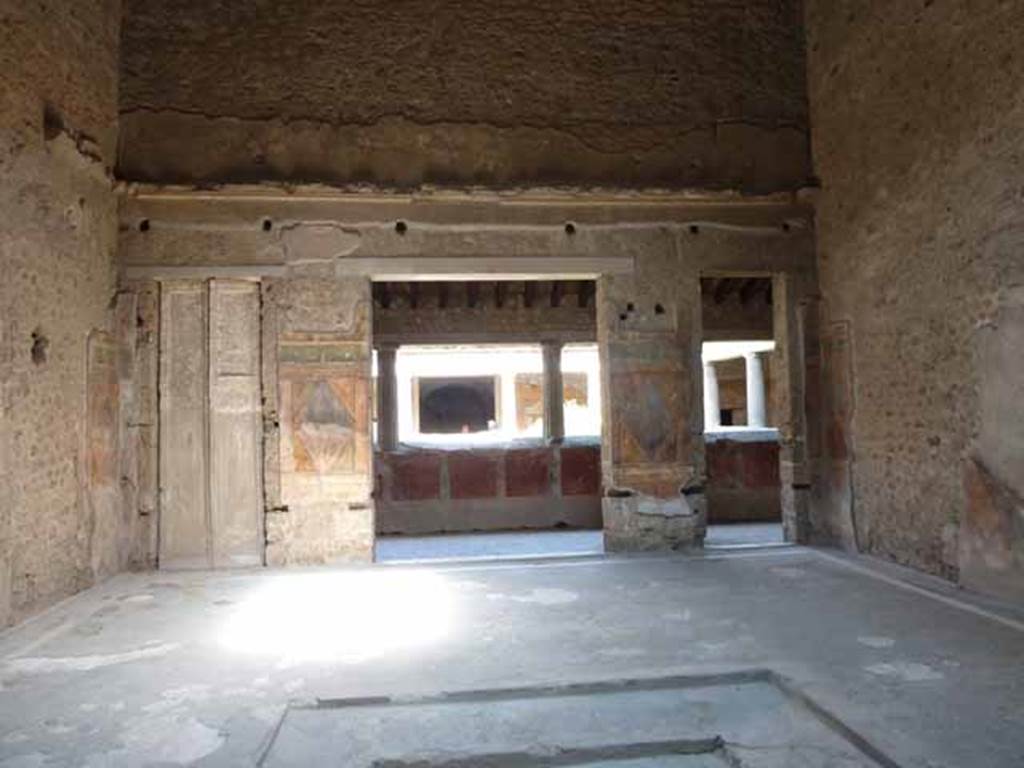 Villa of Mysteries, Pompeii. May 2010. Room 64, east wall with cast of doorway, and large and small doorway to peristyle A.