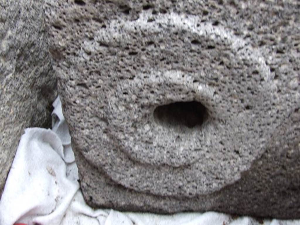 Fountain outside I.16.4. December 2006. Relief of “patera” or plate.