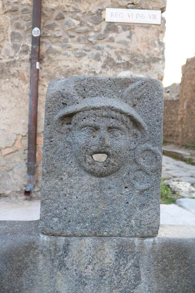 Fountain of Mercury at VI.8.24. December 2018.  
Relief of Mercury, looking west. Photo courtesy of Aude Durand. 

