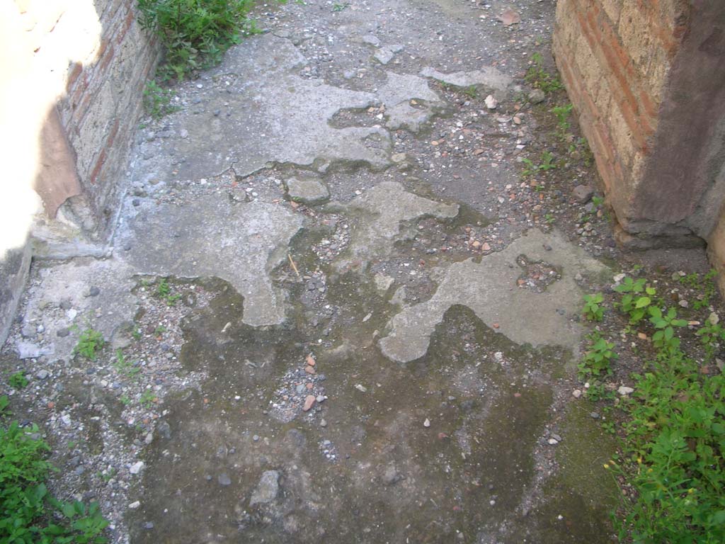 Porta Ercolano or Herculaneum Gate, Pompeii. May 2010. 
East side of gate, detail of flooring at north end. Photo courtesy of Ivo van der Graaff.
