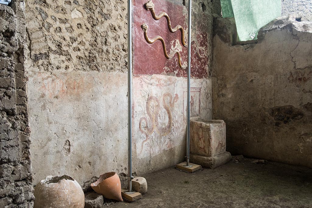 IX.10.1, Pompeii. July 2024. Room 12, looking west along south wall towards altar. Photo courtesy of Johannes Eber.